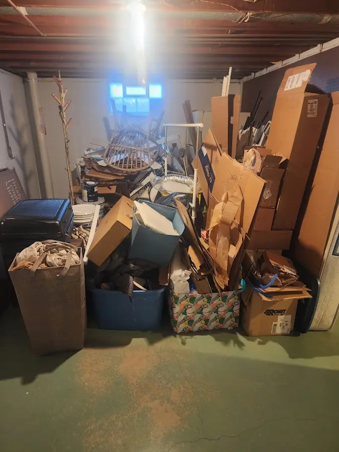 Roll-off dumpster container at job site for 2 Yard Dumpster Rental in Pomona